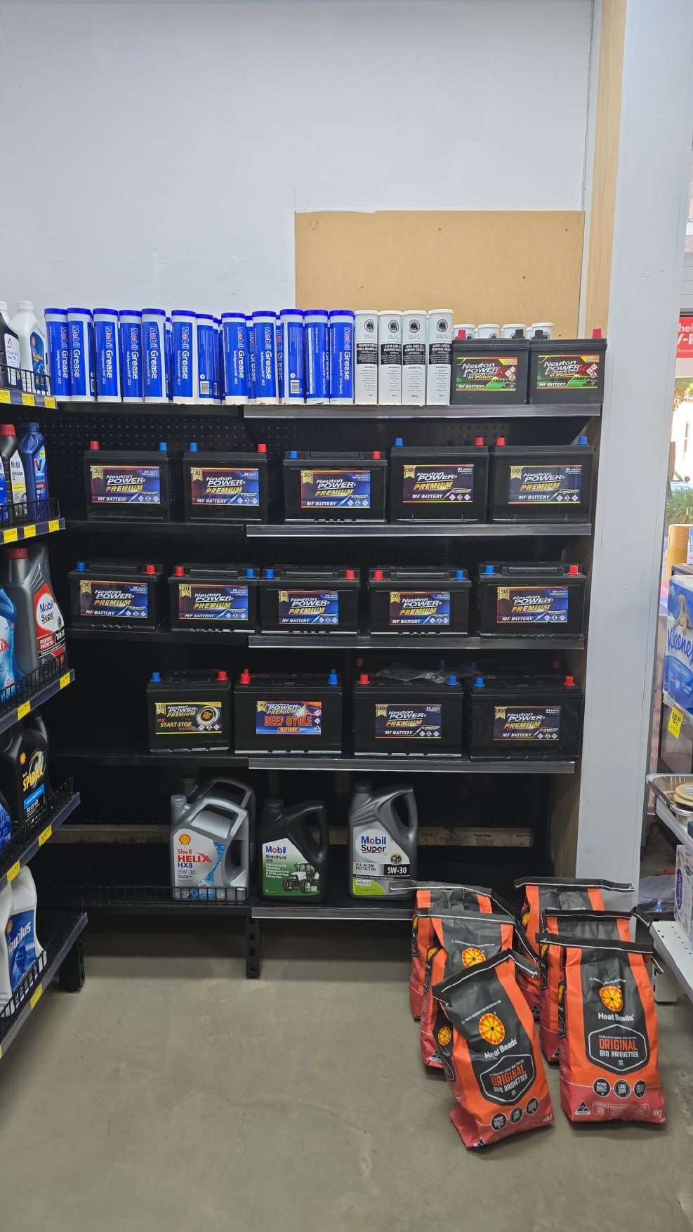 Car batteries on a store shelf