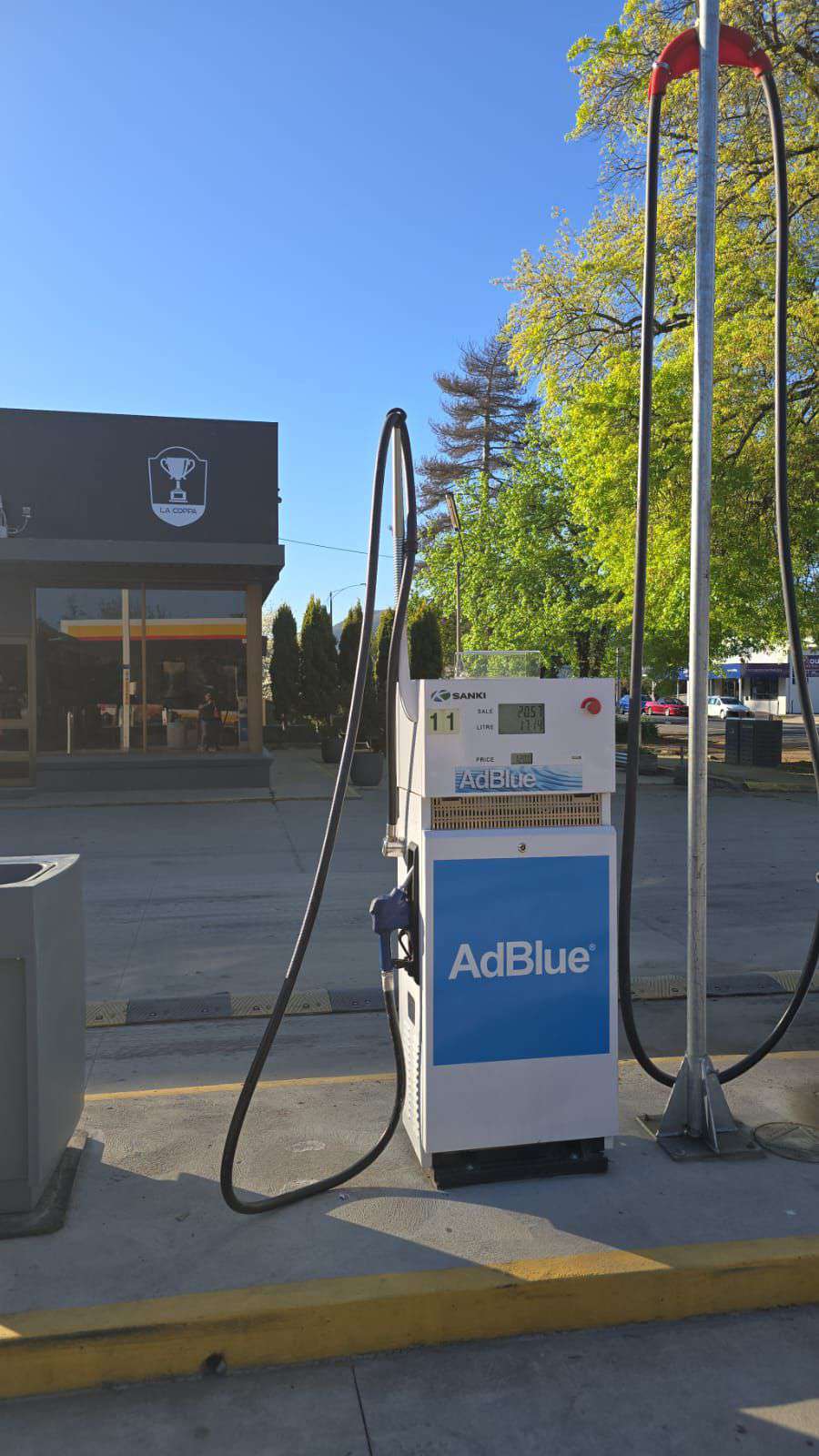 AdBlue dispenser next to the fuel pump