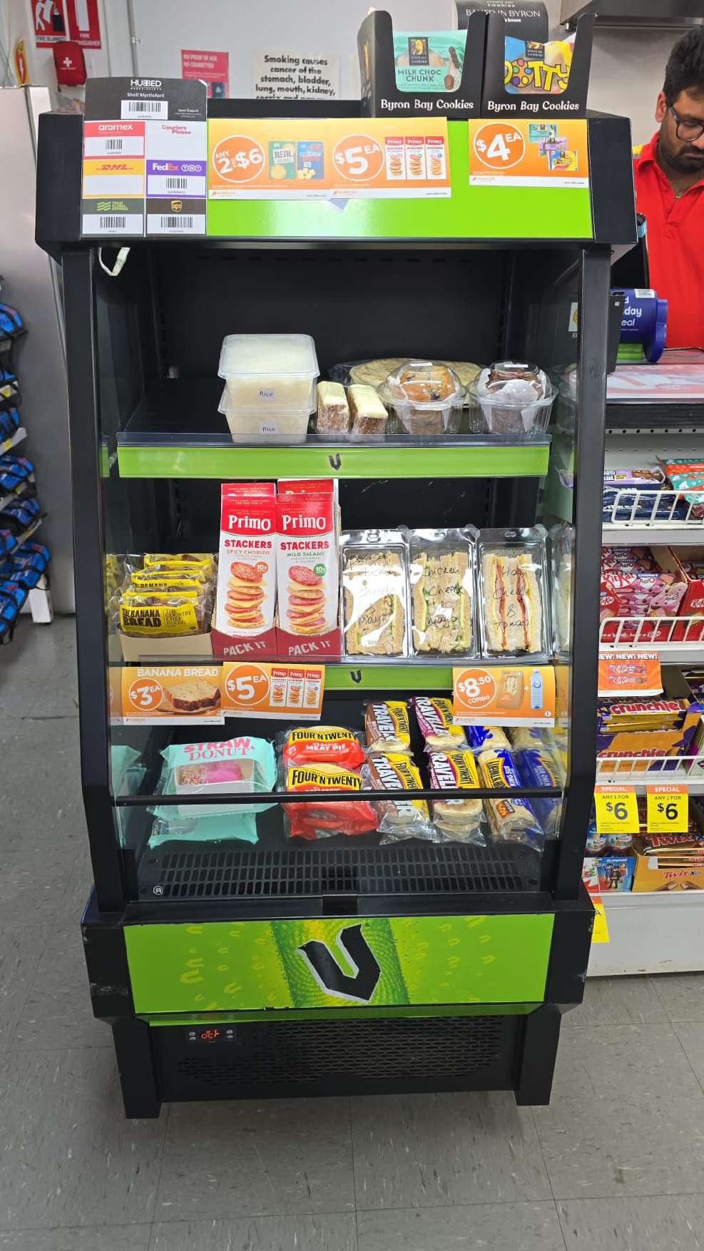 Chilled snack fridge with sandwiches and pies