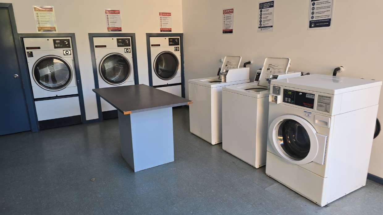 Laundromat with washing machines and dryers