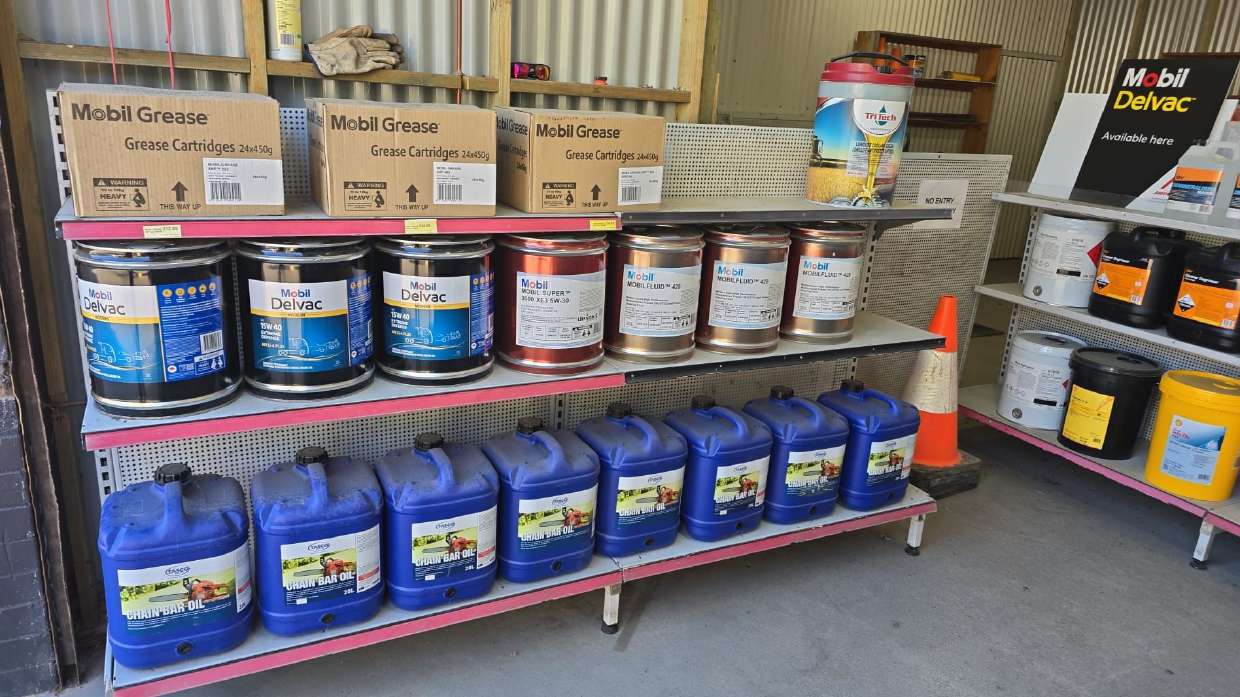 Shelf of lubricant containers
